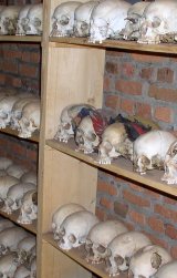 Skulls from the genocide, on shelves in a former church. The two in the centre still have their headscarves intact