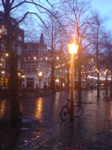 a street in an old European town at dusk