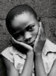 Image of Rwandan girl from book cover of The Overwhelming