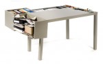 "Messy desk" design from dornob.com 
http://dornob.com/really-messy-desk-design-works-for-real-working-spaces/#axzz2cQi36Ii0
