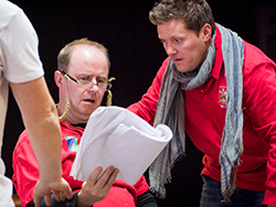 Rhys in rehearsals with Patrick Brennan reading a script 