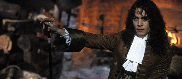 Johnny Depp dressed in restoration costume and long wig